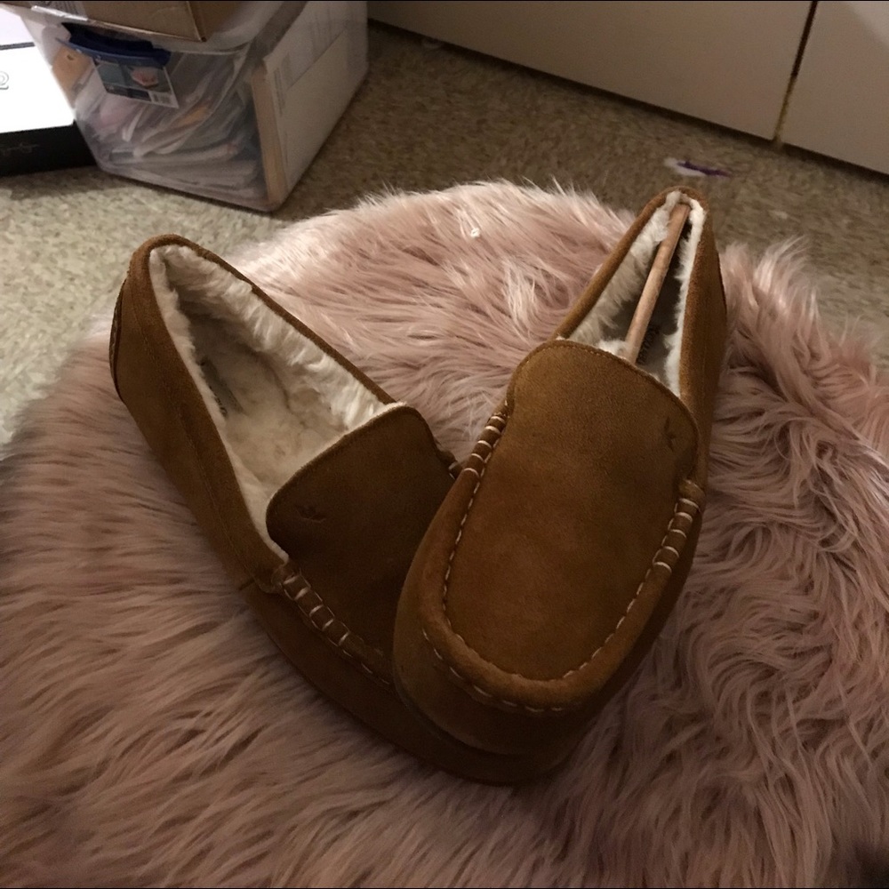 Uggs size 9 women brown moccasin never worn.